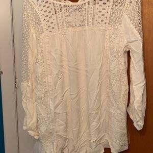 Ladies top creamy with lace inserts